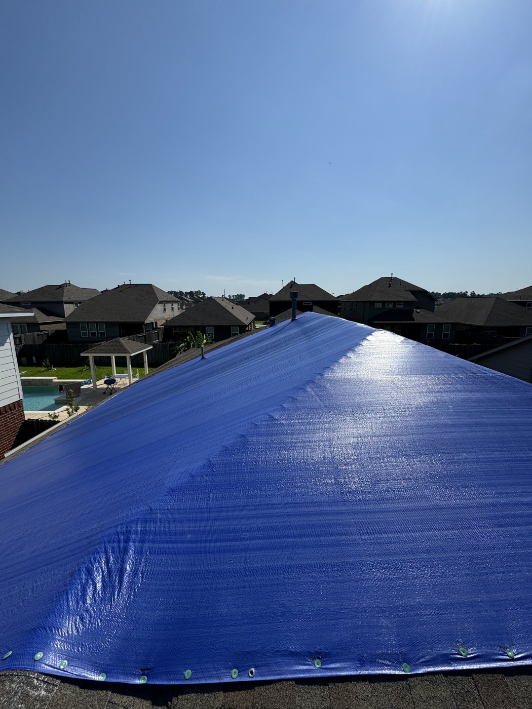 ROOFINITY temporary roof tarp protection